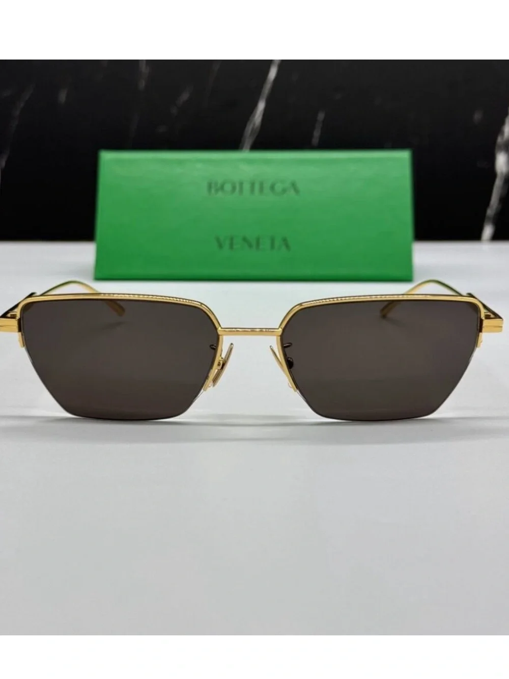 Bottega Veneta Gold Frame Sunglasses with Dark Brown Lenses